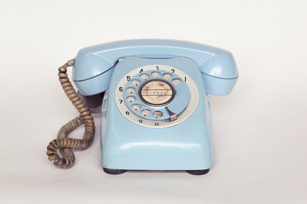 1980s retro telephone in baby blue.